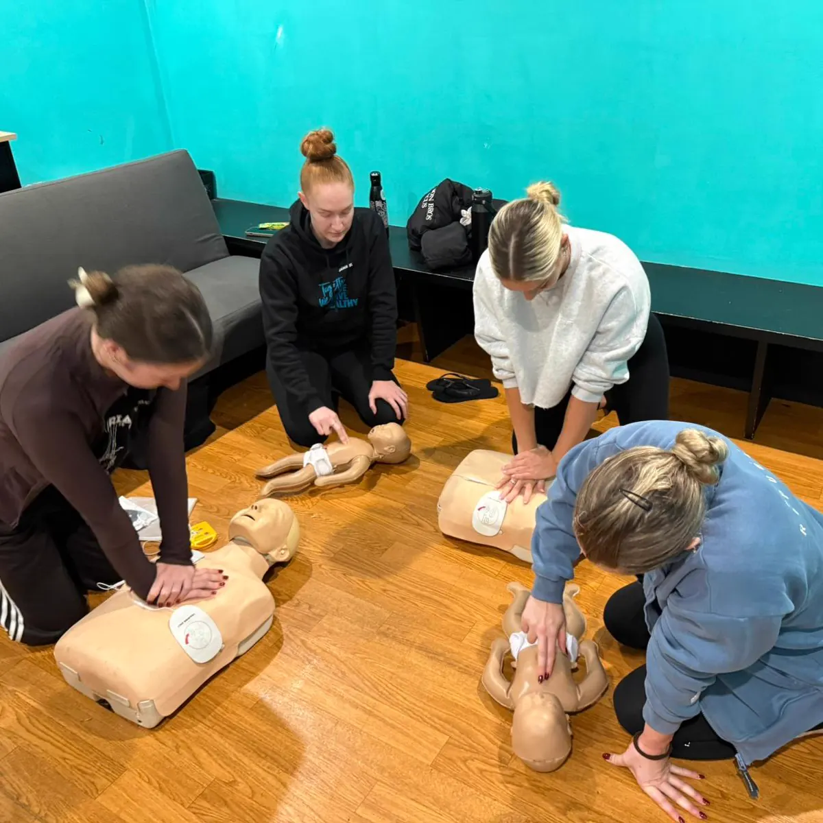Group first aid training session for workplace participants on the Gold Coast